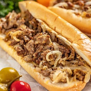 One Medium Cheese Steak, French Fries & Can of Soda Lunch
